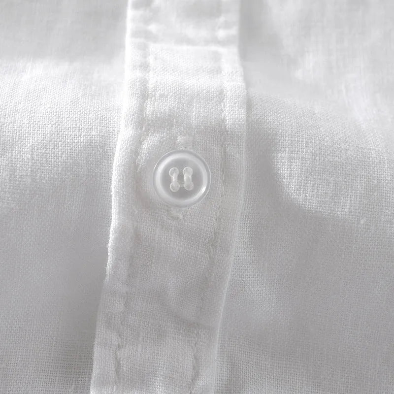 Man wearing a loose fit apricot coloured short sleeve linen cotton blend shirt.