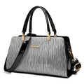 Medium PU leather messenger handbag in horizontal square shape with gold or silver contrast colour