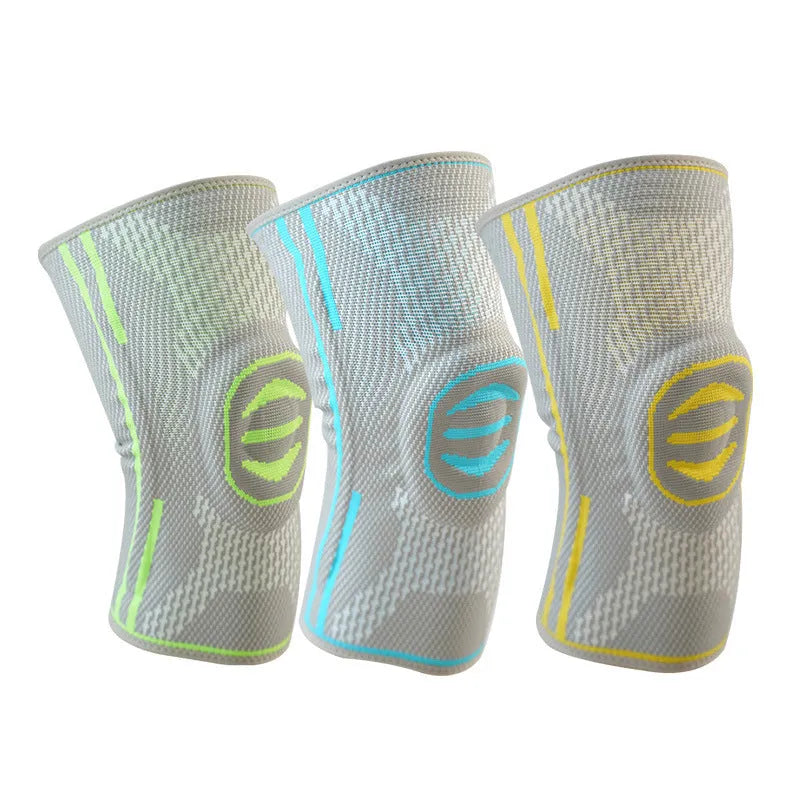 A cotton mountaineering knee pad in blue, shown on a knee.