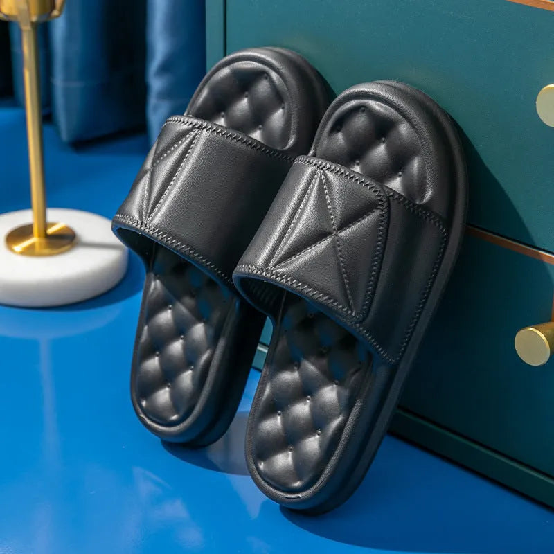 A pair of soft EVA bathroom slippers with a non-slip sole, shown in a selected colour.
