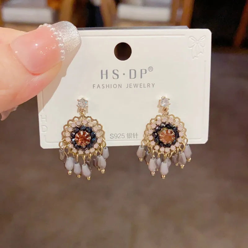 Blue diamond round crystal tassel earrings with thick gold plating and geometric design on copper base