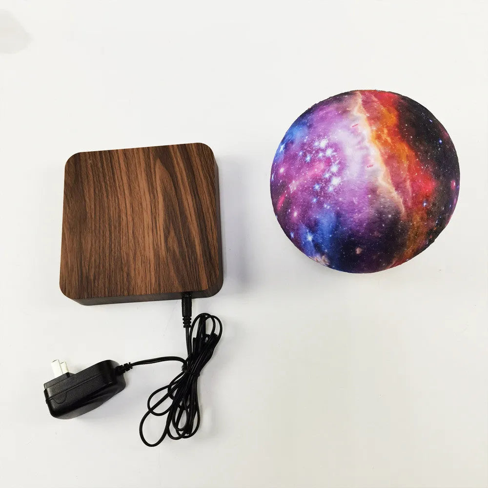 Magnetic levitation galaxy decorative light with rotating moon lamp on circular base