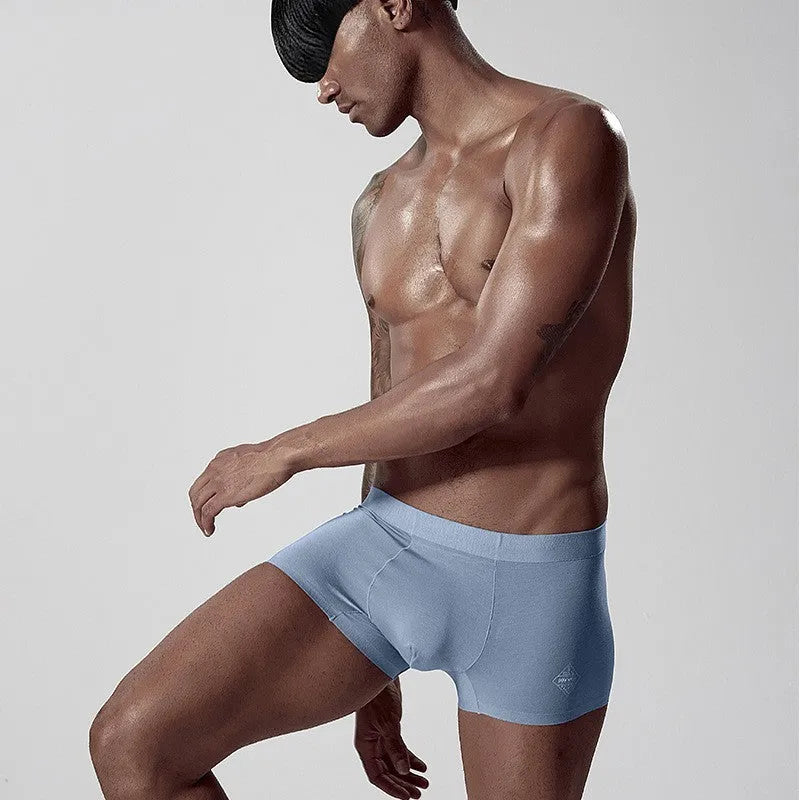 Men's seamless modal underwear in solid colour with mid waist design and shaping functions