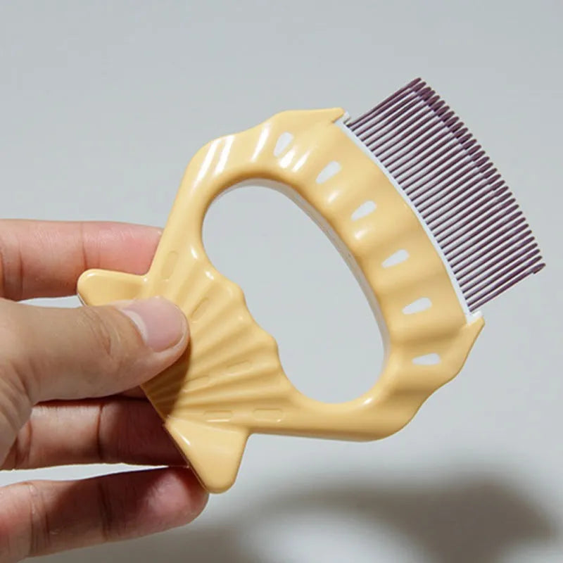 Shell-shaped pet grooming brush for dogs and cats in green colour with anti-slip handle