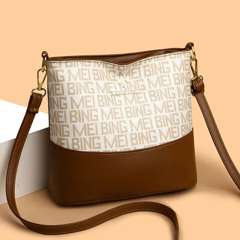 Retro soft PU messenger bag in brown with sewing thread detail and horizontal square shape