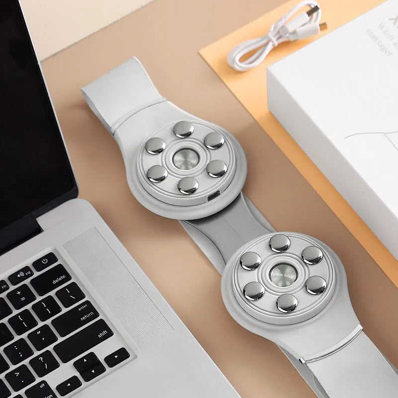 White rechargeable far infrared lumbar massage belt with three gears and Type-C charging port on a flat surface