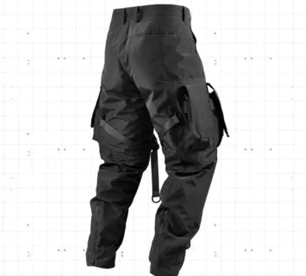 Black waterproof paratrooper trousers with integrated pant straps and 100% polyester fibre construction