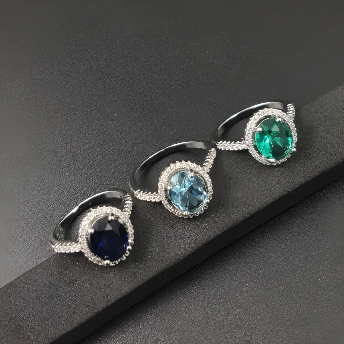 Round zircon ring with electroplated alloy band, available in multiple colours and sizes 6 to 10