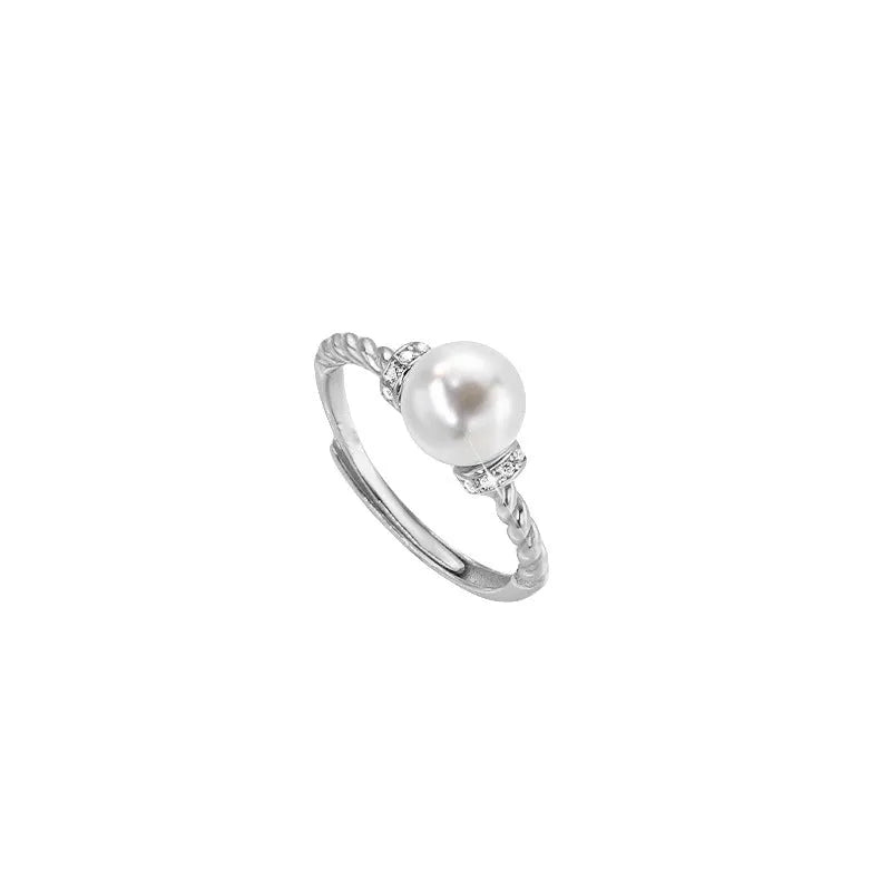 Geometric twist pearl ring with adjustable copper construction in gold colour