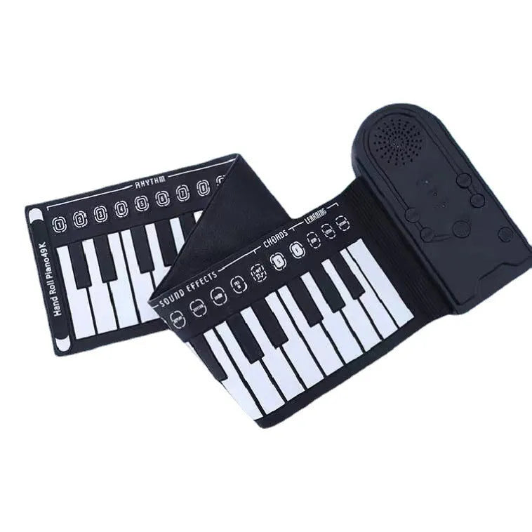 Folding electronic keyboard with 49 silicone keys, shown in gloss black, folded to compact size with speaker visible on control panel
