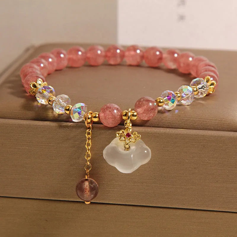 Women's strawberry quartz crystal bracelet with white agate auspicious clouds design