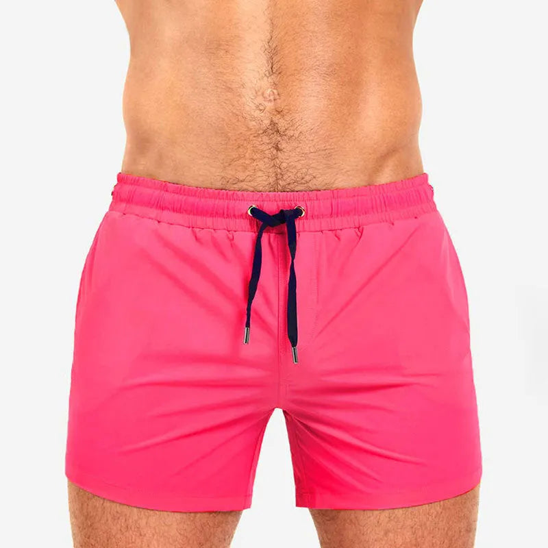 Mesh lining swimming sports fitness shorts in polyester available in six solid colours