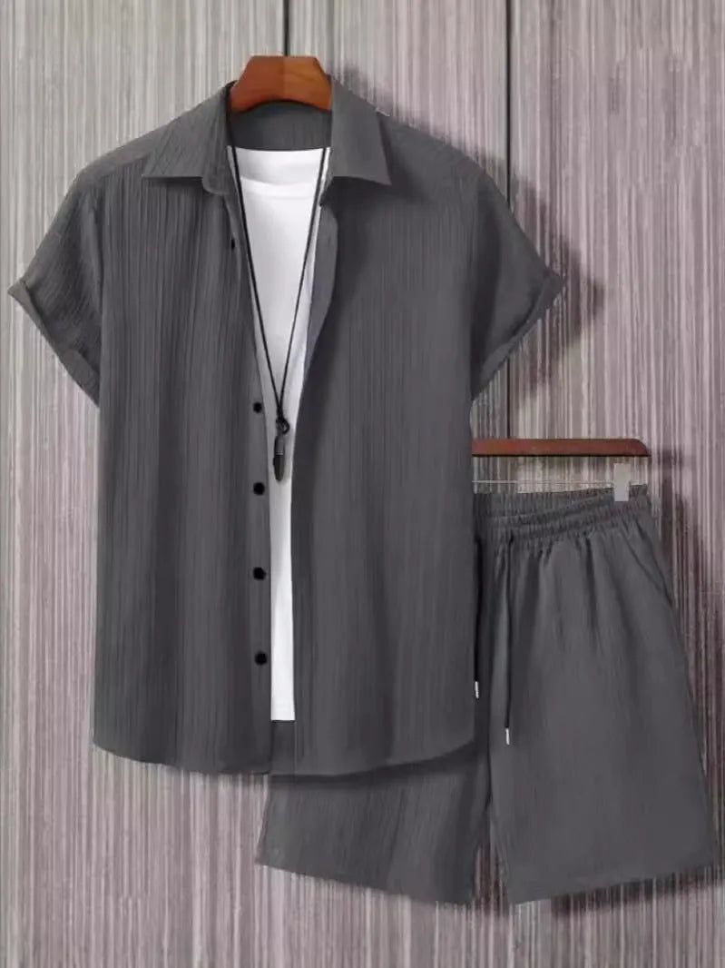 Jacquard fabric short sleeve suit set with matching shorts in a solid colour.
