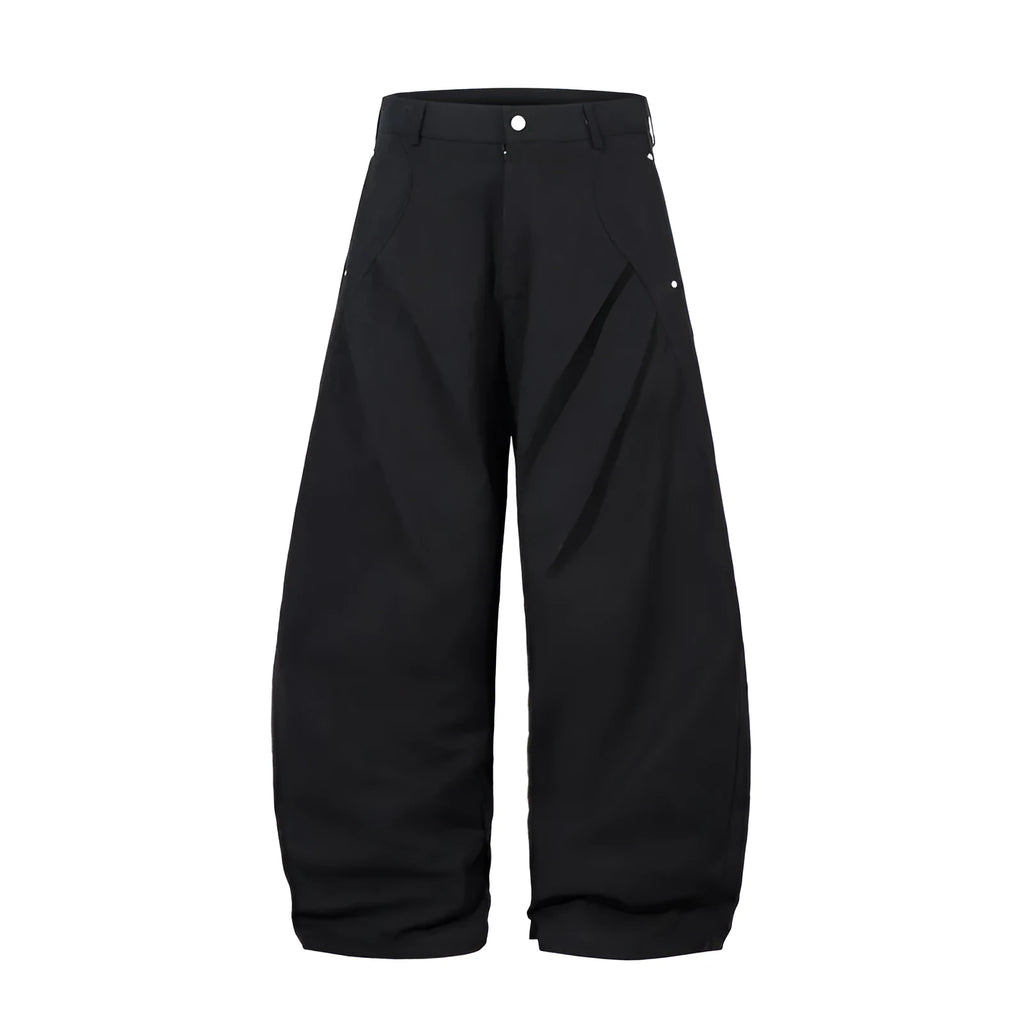 Men's black pleated casual trousers with wide-leg loose fit and machete pleat detailing