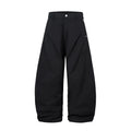 Men's black pleated casual trousers with wide-leg loose fit and machete pleat detailing