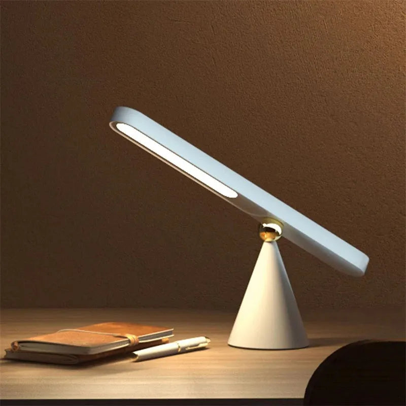 Geometric magnetic table lamp with PC shade in khaki or white featuring touch control and USB power for wall or desk use