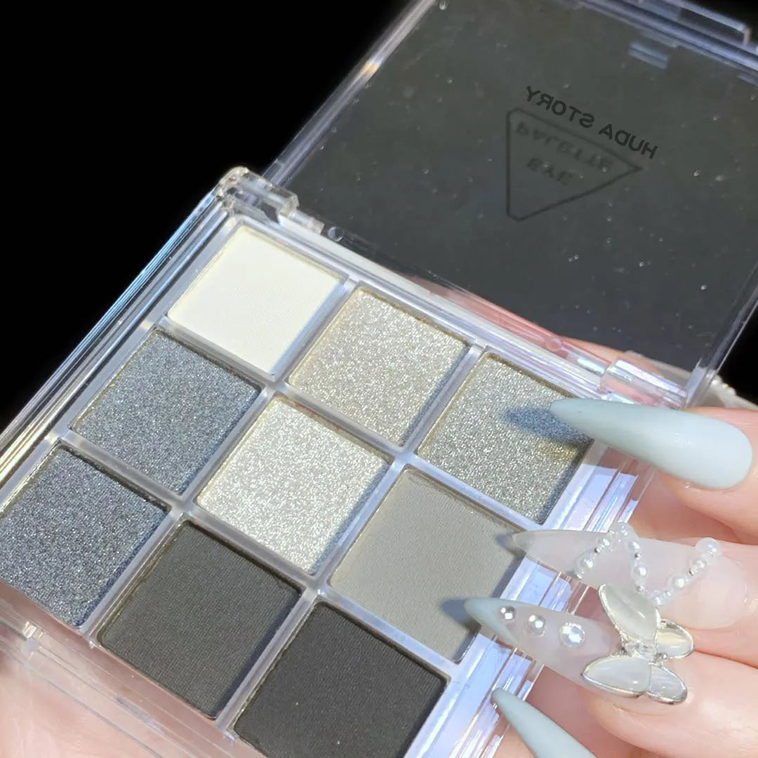INS style nine-colour smoked eyeshadow palette showing white, silver, black, and iron grey shades