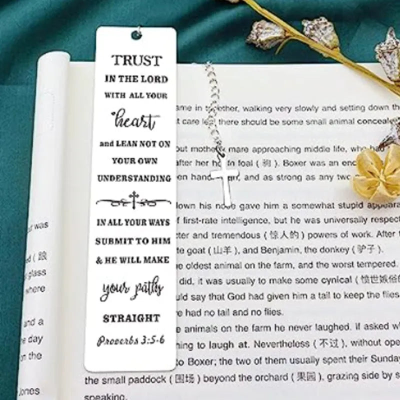 Steel bookmark with an engraved family bible verse design in a metallic finish.