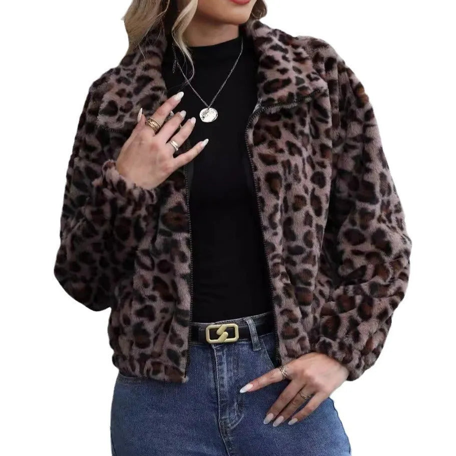 Women's loose-fitting leopard print plush coat with front zipper and raglan sleeves.