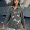 Women's light khaki alpaca wool sweater with oblique zip, turtleneck, and loose lapels
