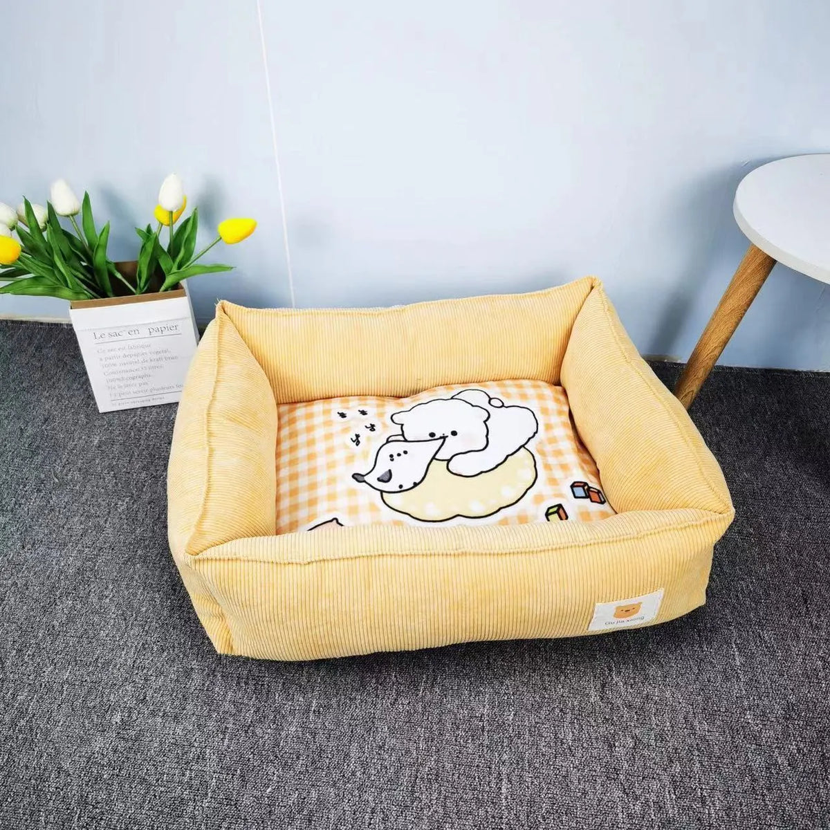A light blue velvet dog nest bed with plush PP cotton filling, shown in a 50x40cm size.
