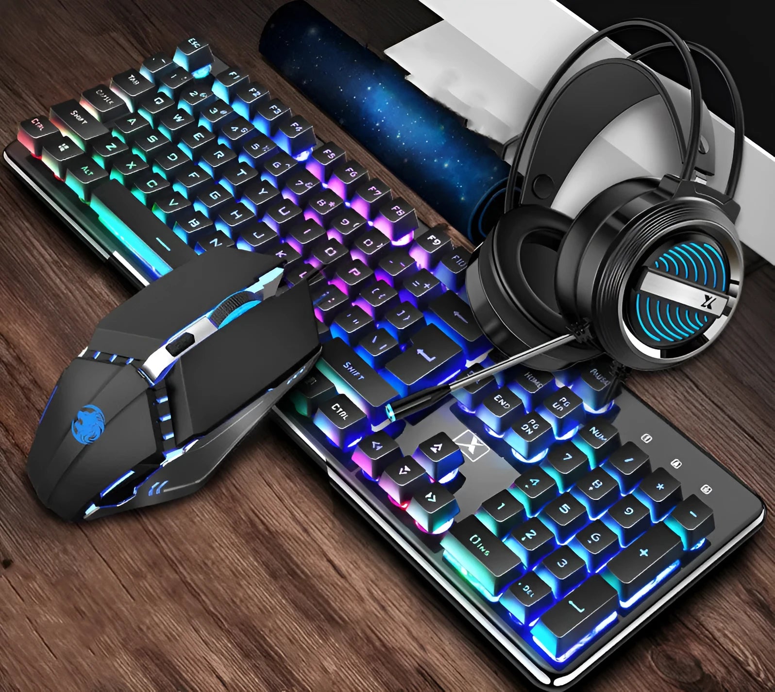 Black three-piece Steampunk Manipulator wired gaming keyboard, mouse and headset set on a desk