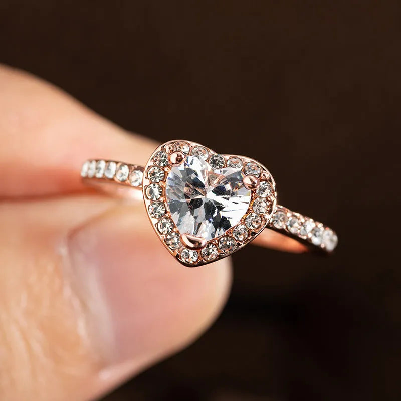 Heart-shaped women's wedding ring with crystal setting in rose gold or silvery electroplated finish