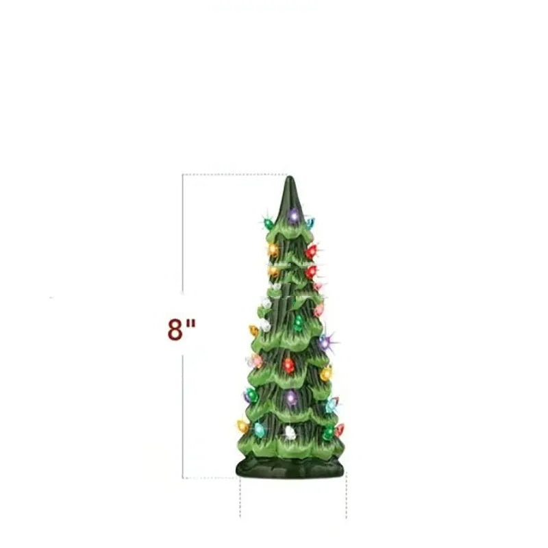 A resin Christmas tree-shaped lamp ornament with LED lights, shown in different sizes on a table.