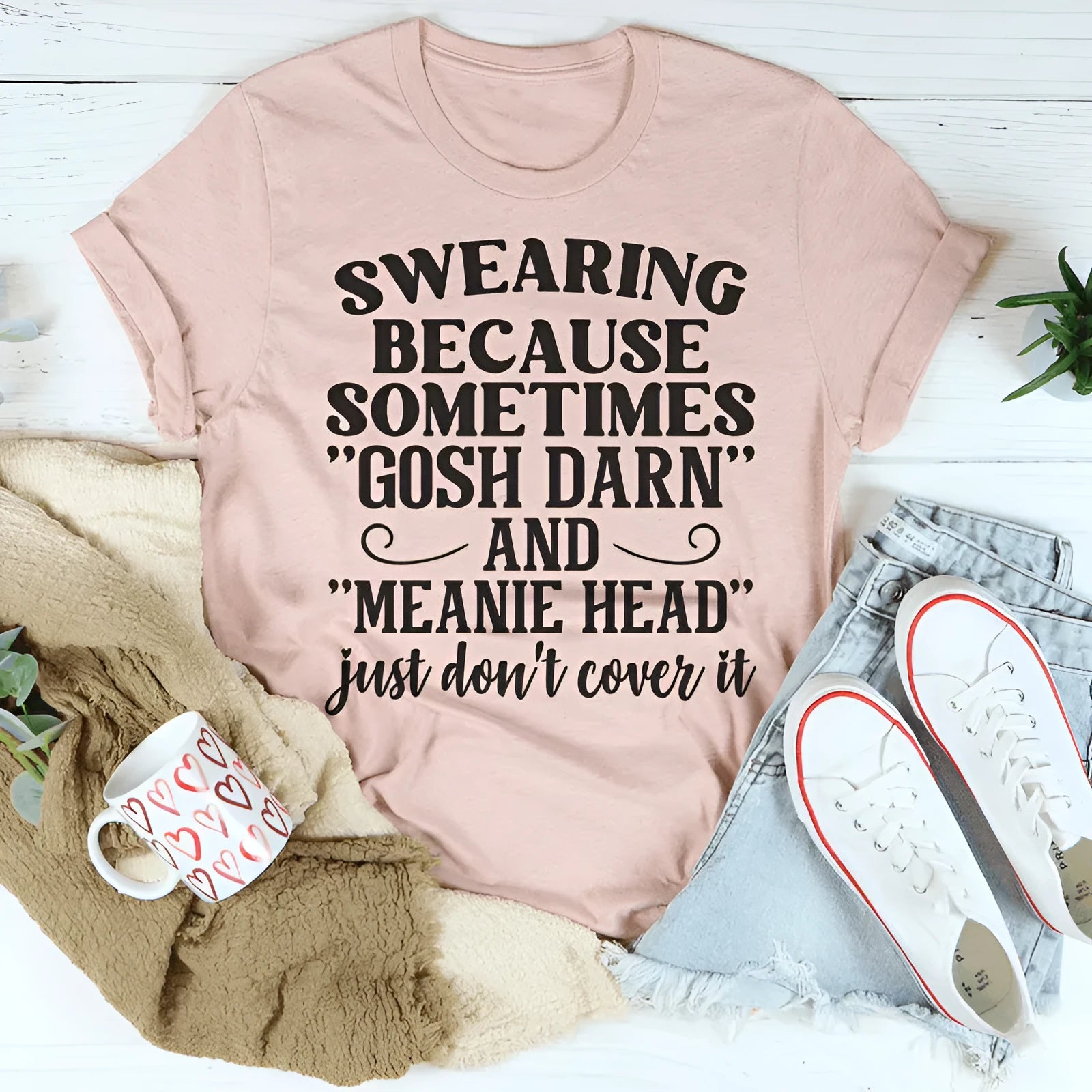 A pink straight-cut casual pullover t-shirt for men and women, made from polyester, shown flat.