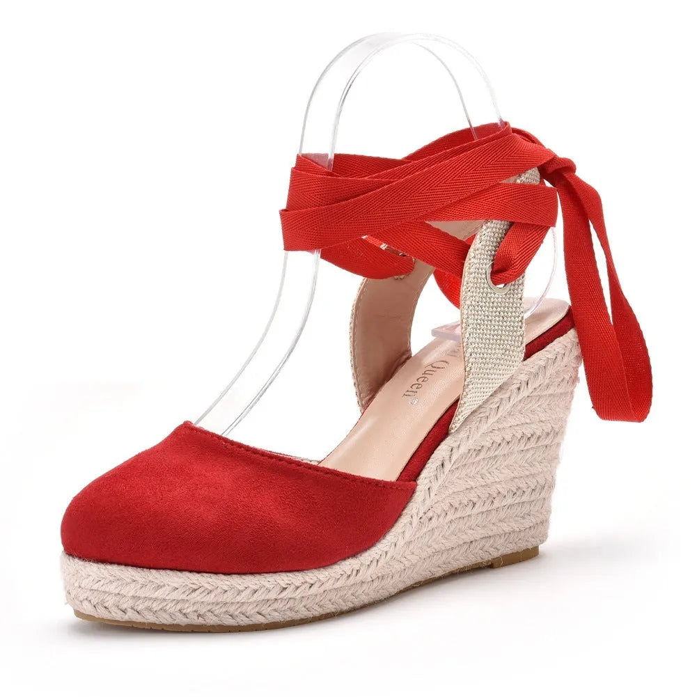 Women's apricot wedge sandals with buckle strap and beaded tassel detail on a low-cut artificial PU upper.