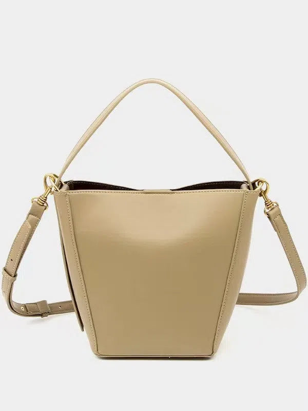 New Springsummer urban minimalist crossbody shoulder bag bucket style in black PU with front pocket