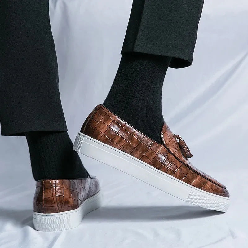 Men's plus size leather-look sneakers with tassel decoration in black, available in sizes 38 to 47