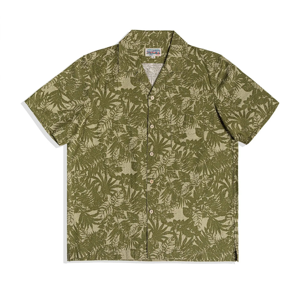 Vintage floral print seersucker shirt with a Cuban collar on a mannequin, showing loose cardigan fit.