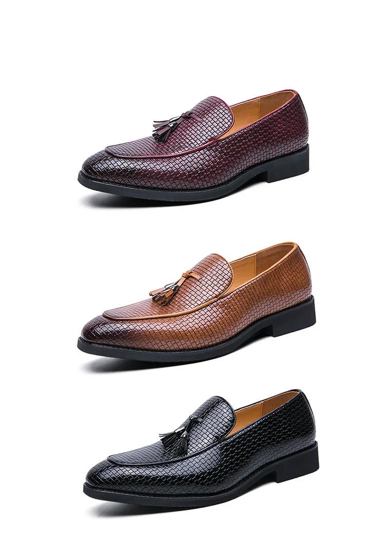Men's black pointed toe slip-on loafers with a tassel detail on the artificial PU upper.