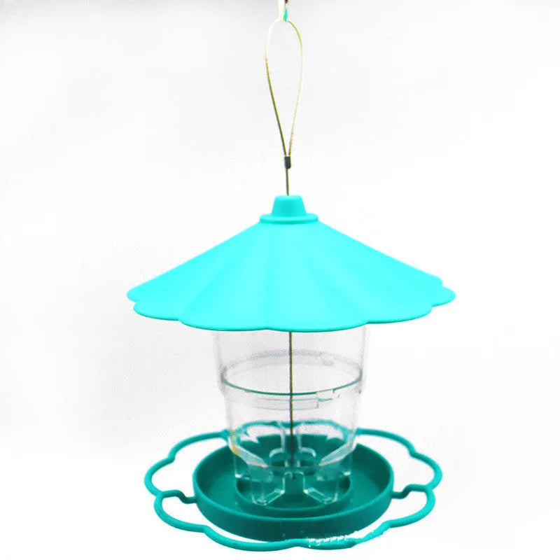 Collapsible wild birds feeder hanging birdcage with removable roof and large capacity bowls in outdoor garden setting