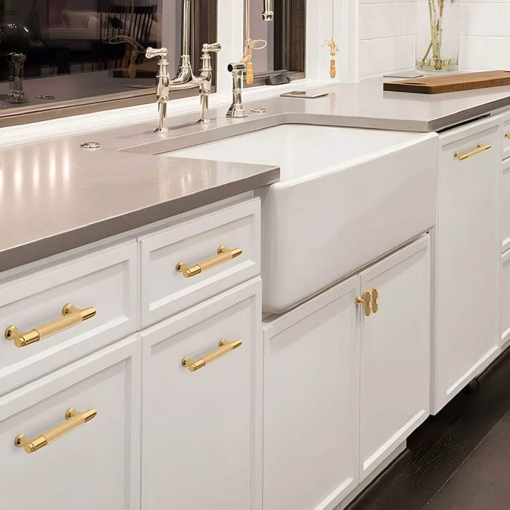 Brushed brass aluminium furniture handle for cabinet doors and drawers.