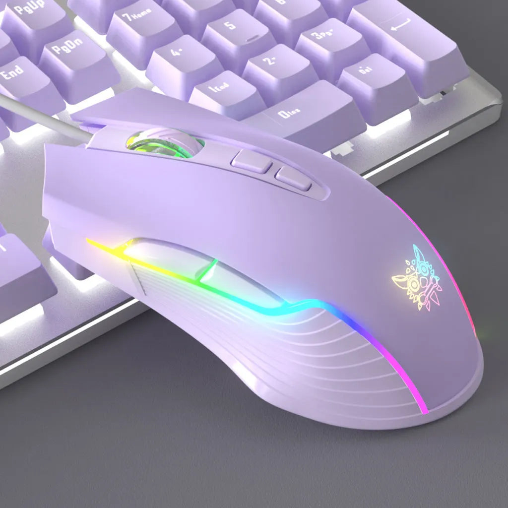 Purple-white mechanical keyboard and mouse gaming bundle with backlight illumination on desktop setup