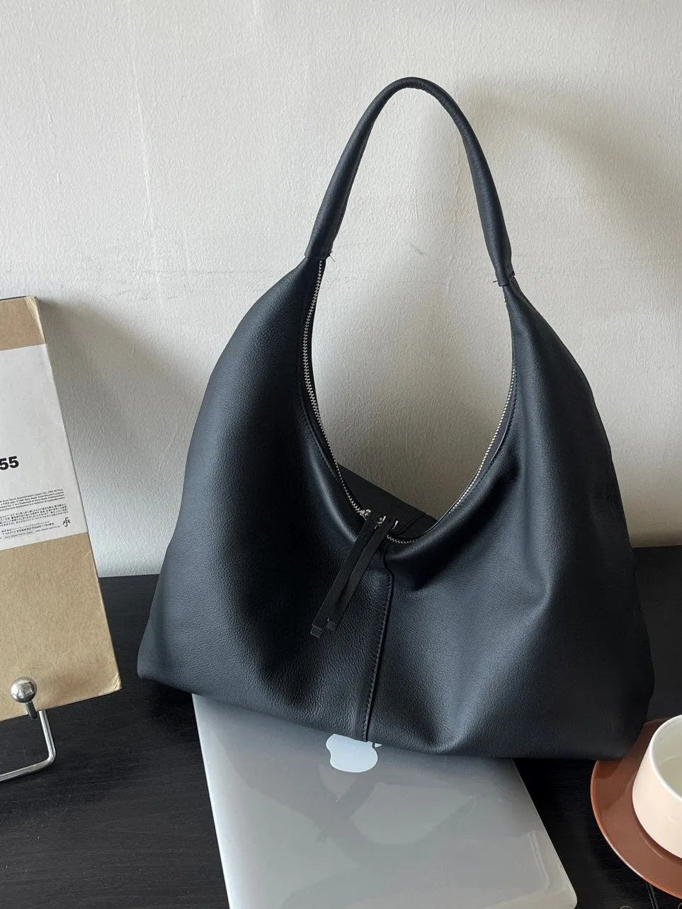 Genuine leather crescent underarm bag in ankarat red with sandwich pocket and single shoulder strap