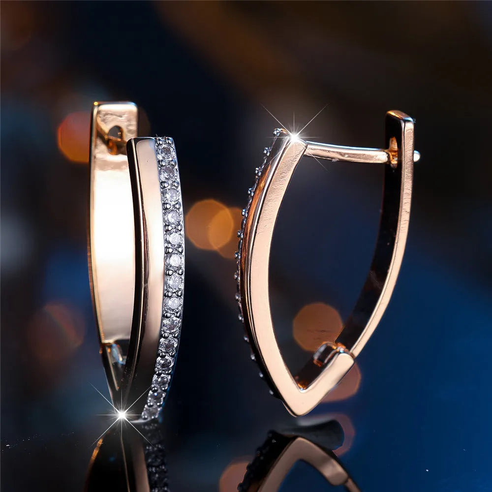 Geometric V-shaped women's ear clips with champagne gold electroplated finish on copper