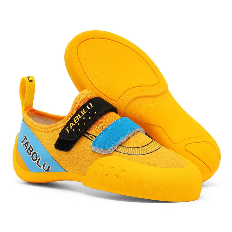 Men's and women's black beginner rock climbing shoes with coloured accents and Velcro strap