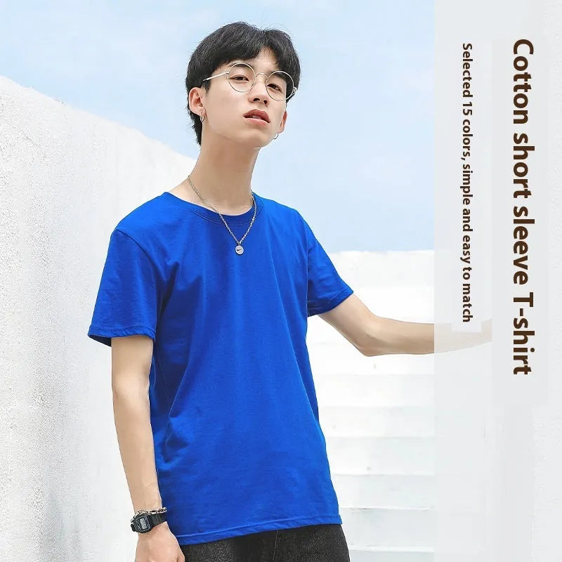 Men's solid colour round neck cotton T-shirt on a hanger, showing short sleeve and casual pullover style.