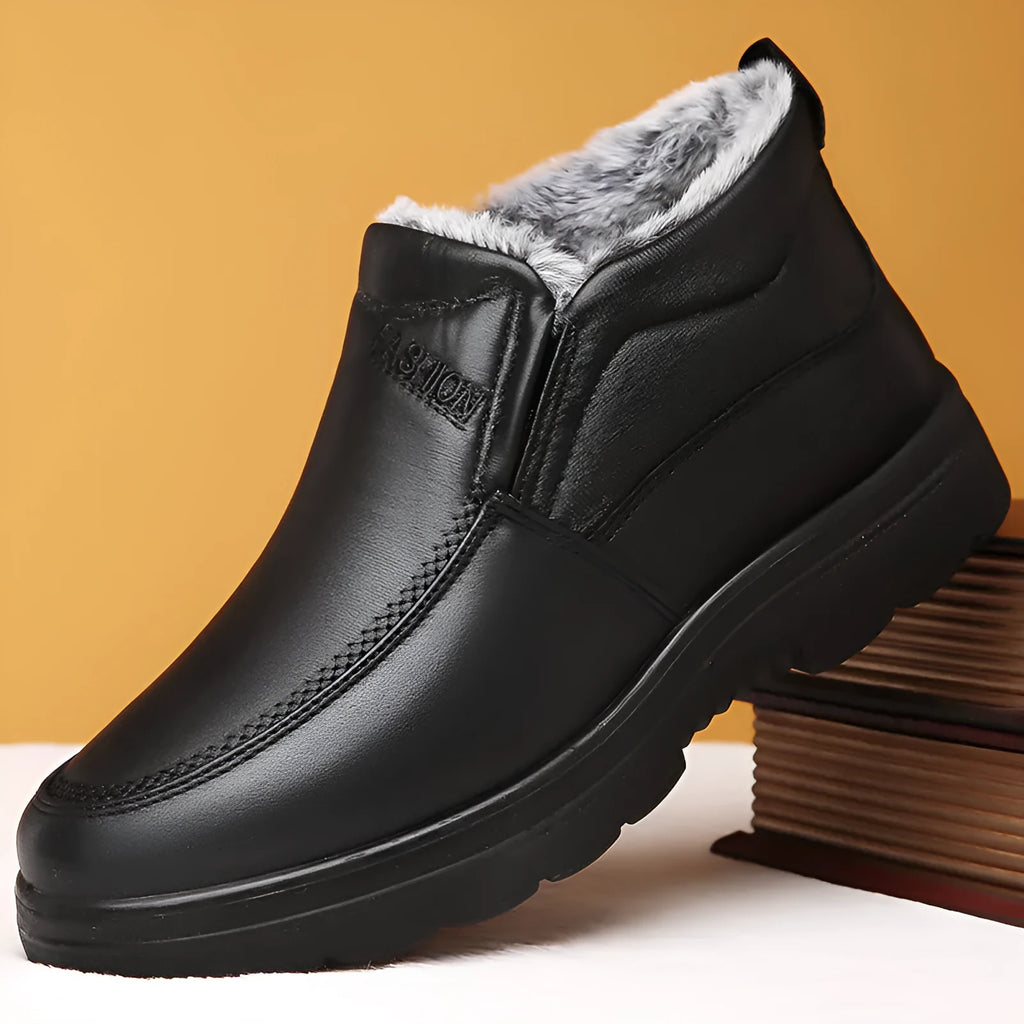 Men's black fleece-lined winter slippers with non-slip rubber sole and slip-on design