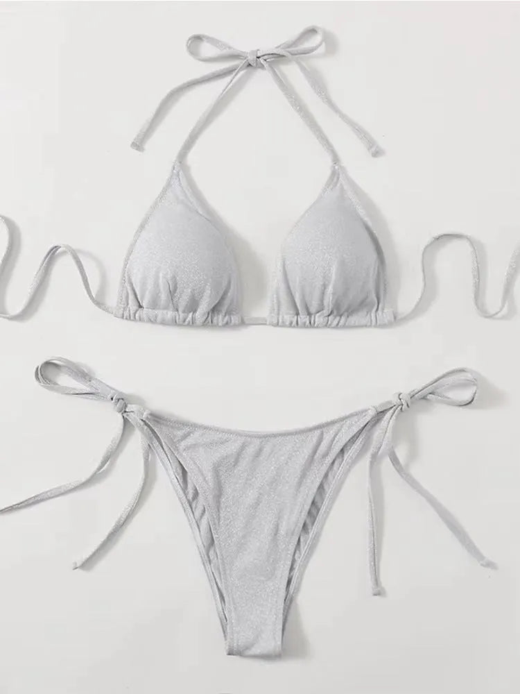 Women's khaki gold bandage bikini swimsuit with split briefs design on a mannequin.