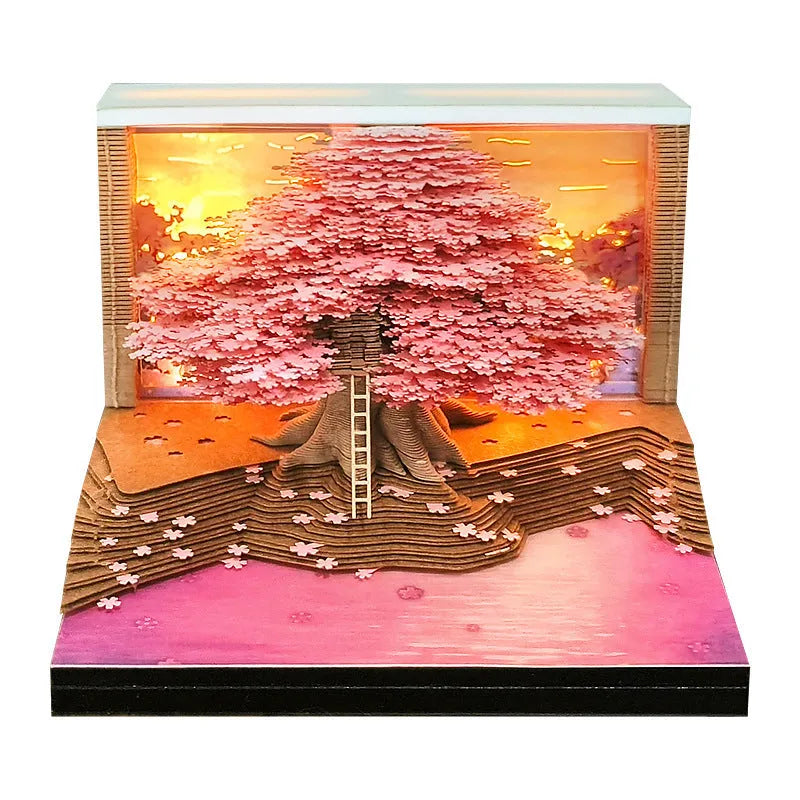 2026 desk calendar with 3D Cherry Tree paper sculpture on a desk, 8.5 x 8.5 x 6.4 cm