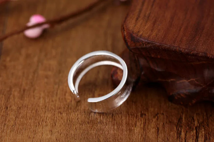 Geometric adjustable opening sterling silver ring with frosted finish and electroplated silver colour