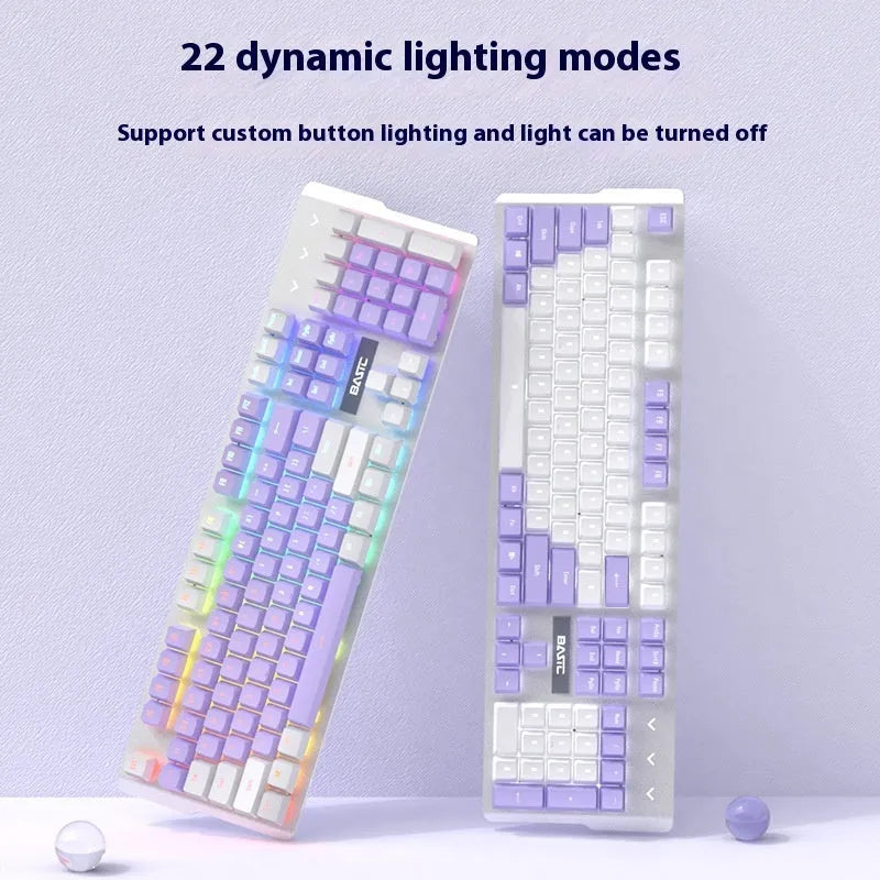 Purple-white mechanical keyboard and mouse gaming bundle with backlight illumination on desktop setup