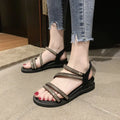 Gold Korean-style women's flat sandals with rhinestone design and elastic band