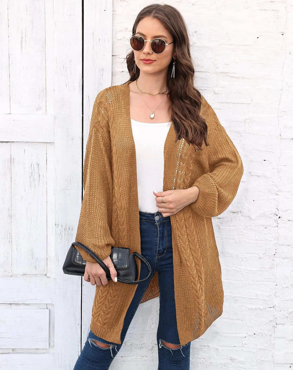 Women's loose fit acrylic sweater coat in solid colour with European styling