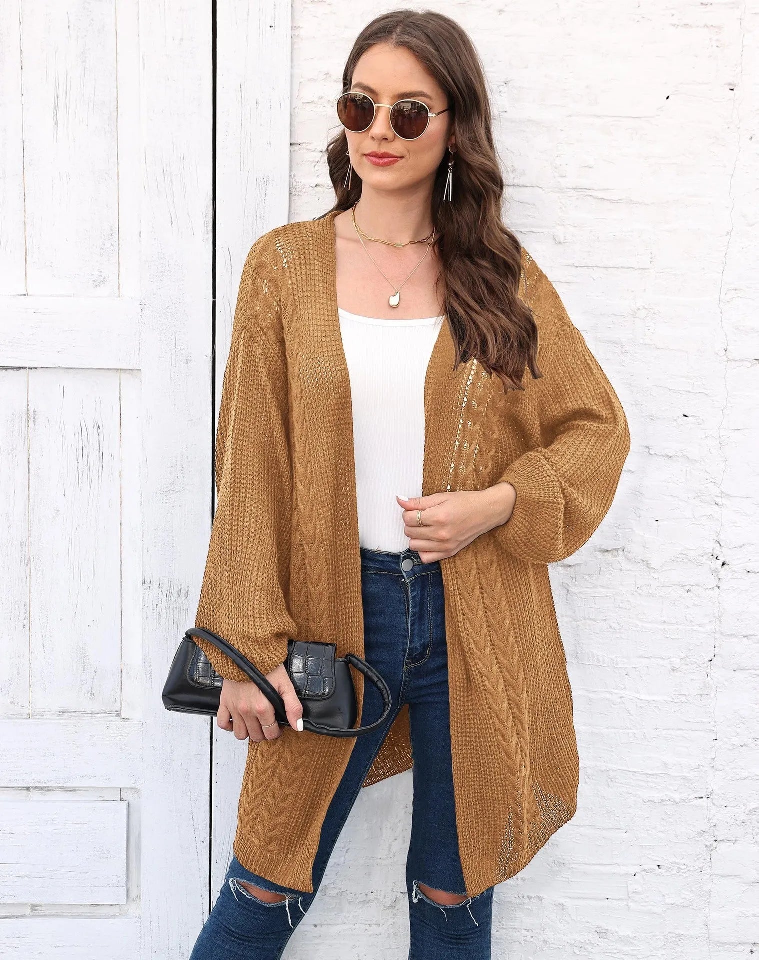 Women's loose fit acrylic sweater coat in solid colour with European styling