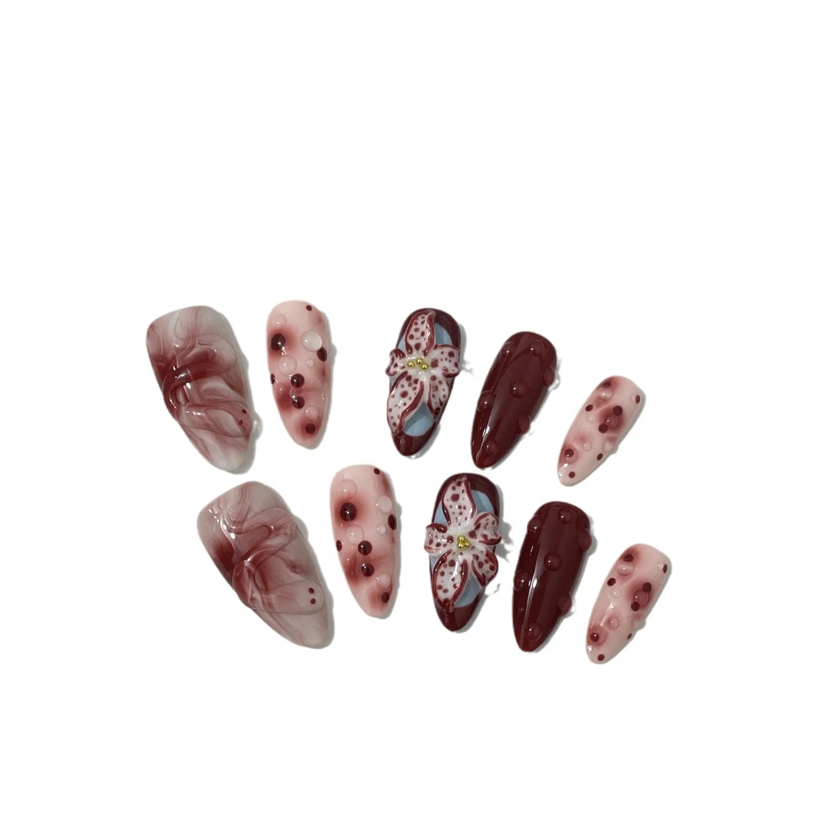Hand-painted three-dimensional carved almond artificial nail extensions showing rose and tulip patterns